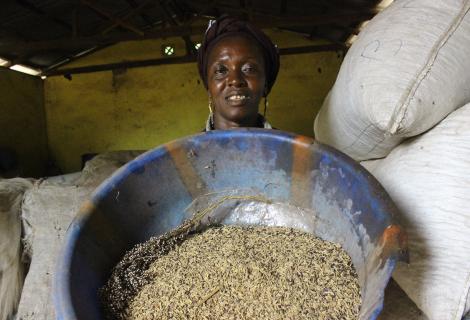 Kadiatu Kamara poses in the store with her seeds.