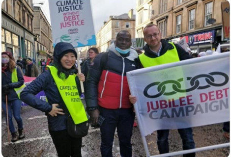 BAN Coordinator Abu Bakarr Kamara (middle) flanked by the UK Jubilee Debt campaign team