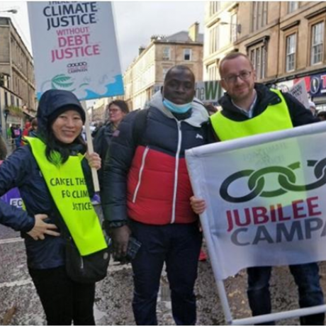 BAN Coordinator Abu Bakarr Kamara (middle) flanked by the UK Jubilee Debt campaign team