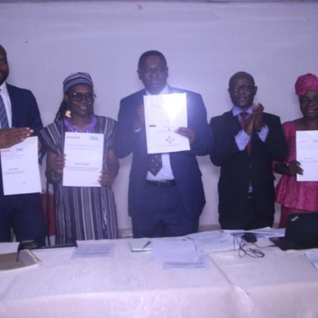 Symbolic launch of the Report and Policy -ActionAid Sierra Leone Executive Director, Policy and Advocacy Manager, BAN, Tax Movement Team Lead, Deputy Minister of Finance 1, CEO bettFirm, Facilitator and Consultant doing symbolic presentation of the report